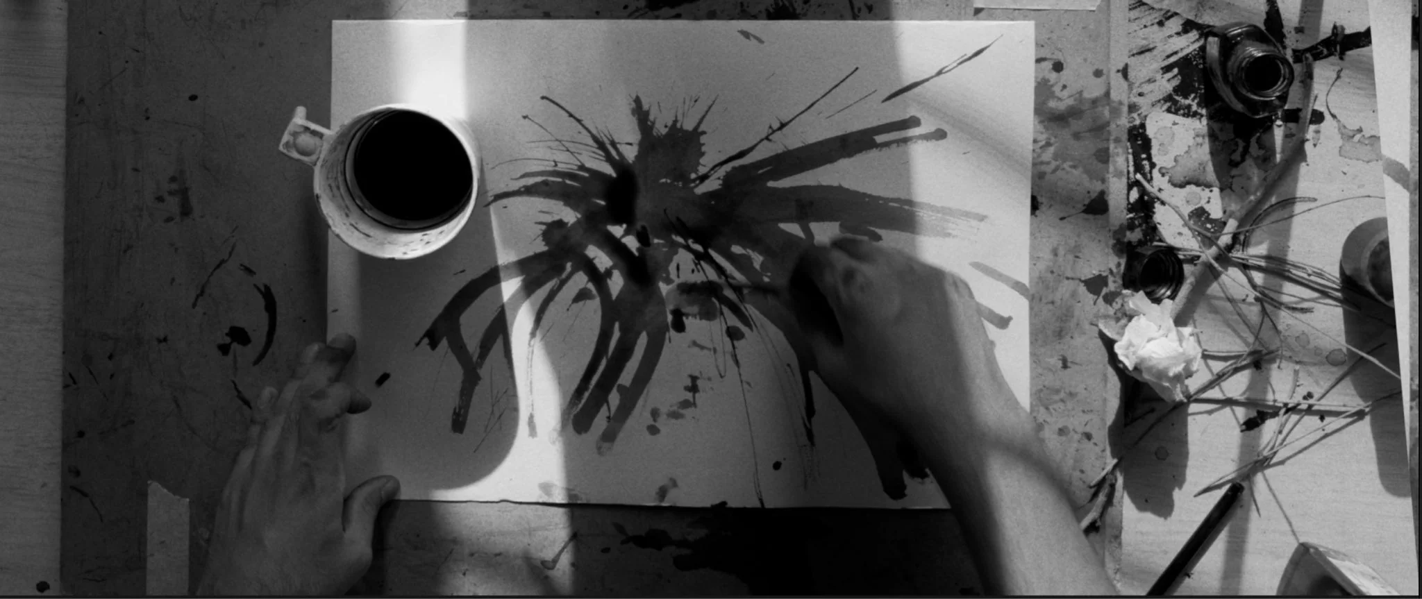 Hands Drenched in Black Ink